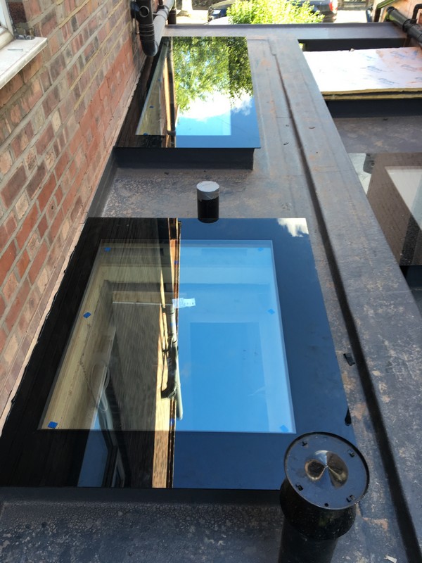 Multiple flat roof skylights on extension in Northwood